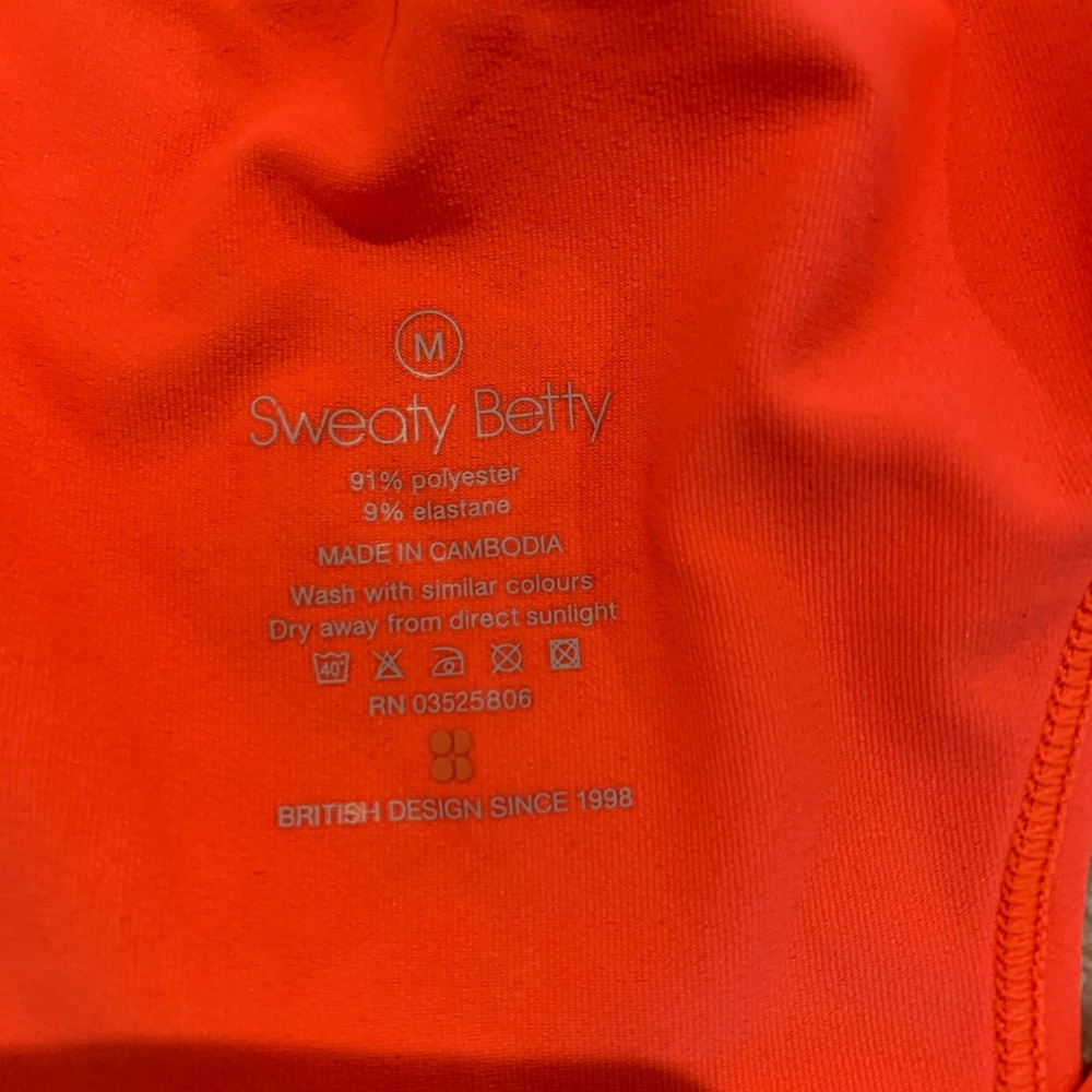 Sweaty Betty orange workout tank top
